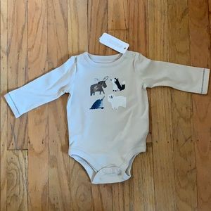 Tan long sleeve one piece for a baby 0 to 3 months